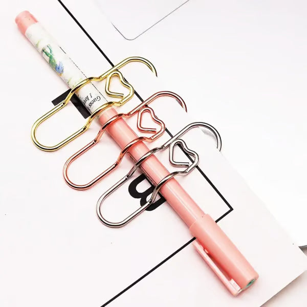 Dernier Jour -50% | CharmClip™ Clips stylés en forme de cœur pour stylos (6 pièces)